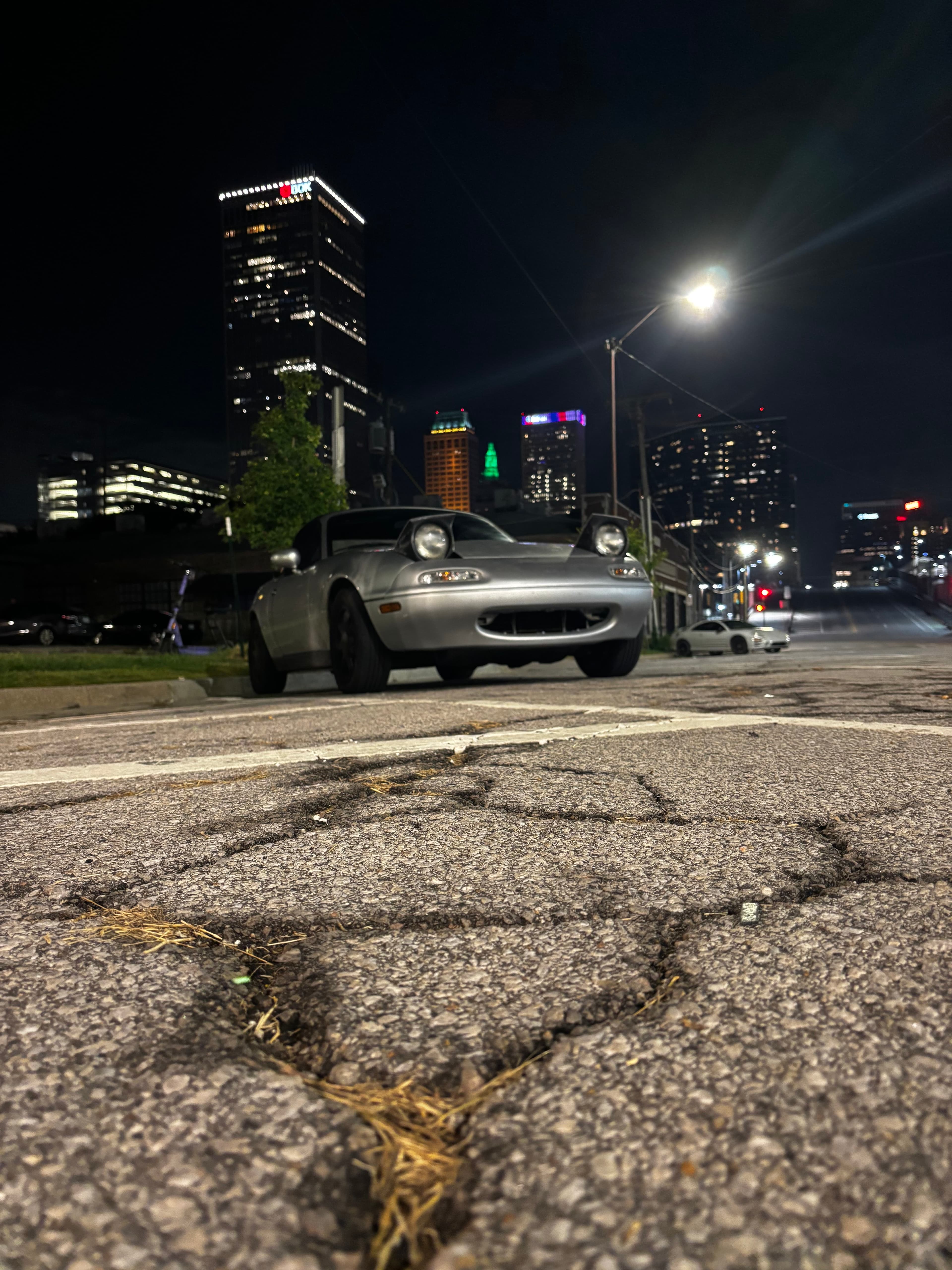 Low angle downtown shot of 1990 Miata